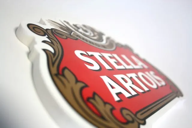 a beer logo on a sign for beer sign ideas
