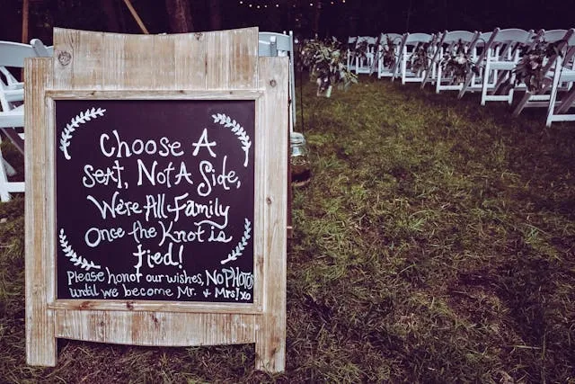 a wooden wedding sign for signage cost