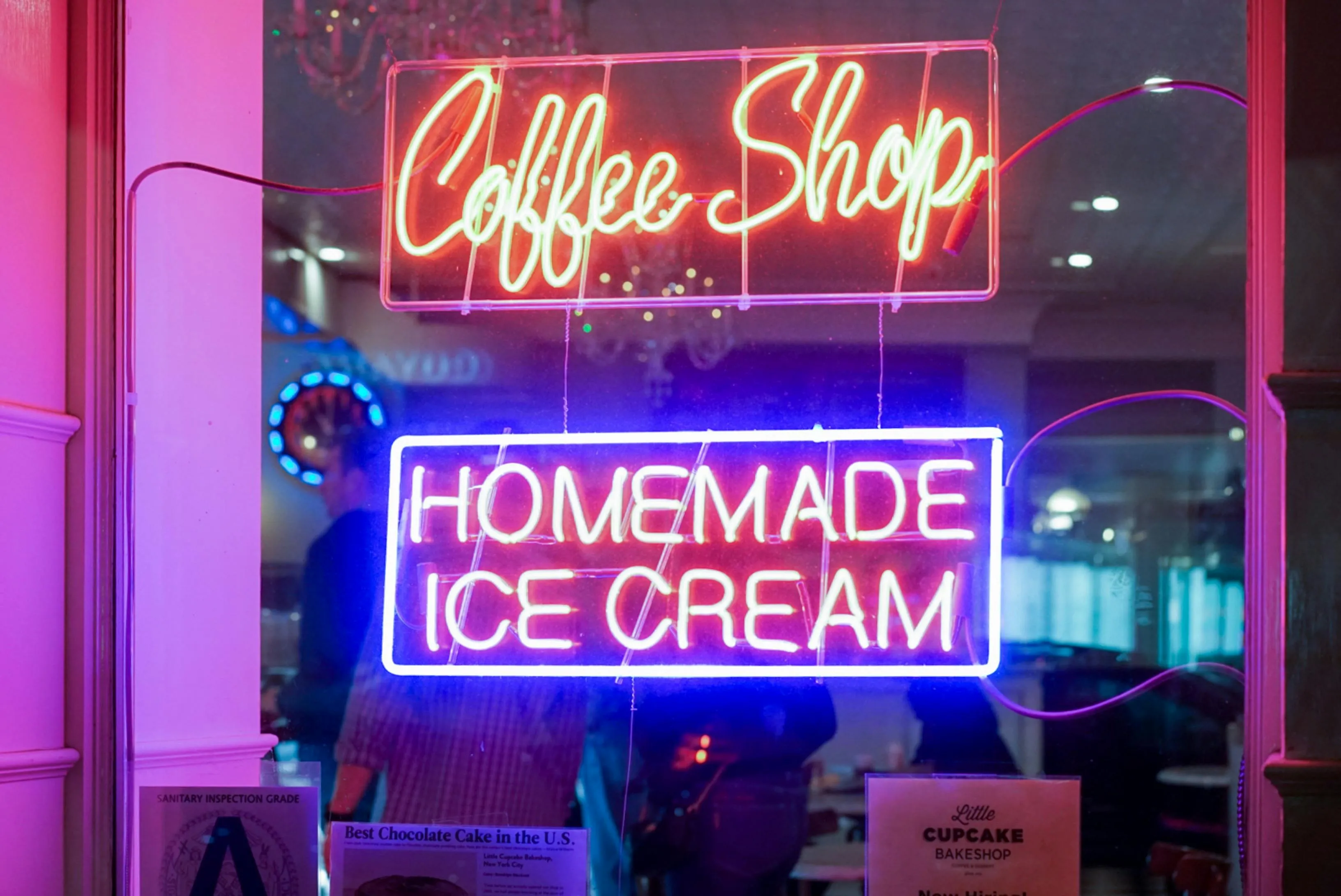 neon signs in a window for gas in neon lights